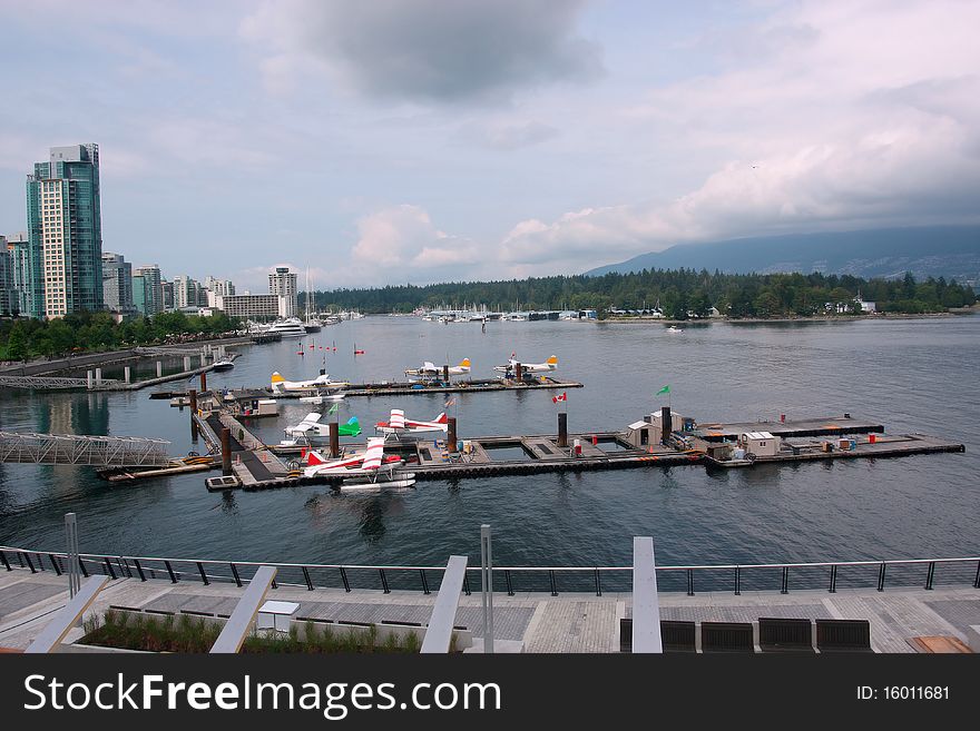 Sea charter tourist planes parked on the water in Vancouver BC Canada. Sea charter tourist planes parked on the water in Vancouver BC Canada.