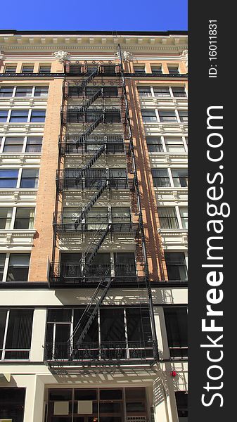 Fire escape ladders on a building in downtown Portland Oregon. Fire escape ladders on a building in downtown Portland Oregon.