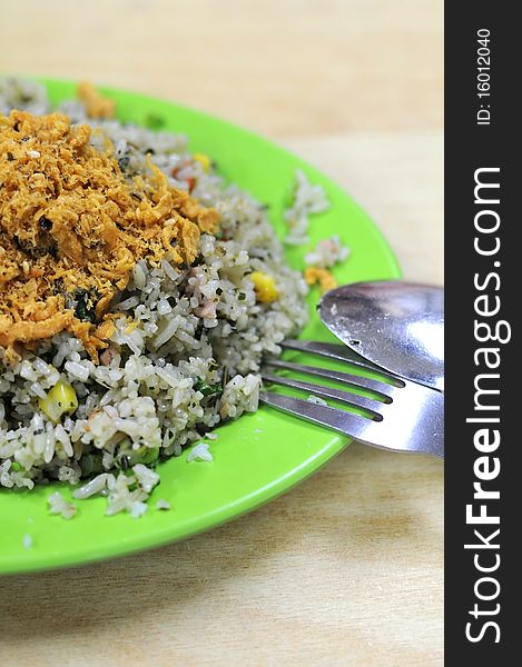 Asian vegetable olive fried rice with pork floss topping. Suitable for concepts such as diet and nutrition, healthy lifestyle, and food and beverage. Asian vegetable olive fried rice with pork floss topping. Suitable for concepts such as diet and nutrition, healthy lifestyle, and food and beverage.