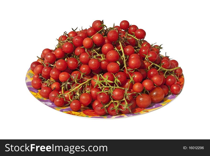Little red tomatoes in a plate  on white background