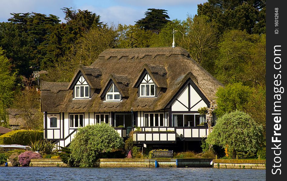 View of a house on the Norfolk Broads. View of a house on the Norfolk Broads