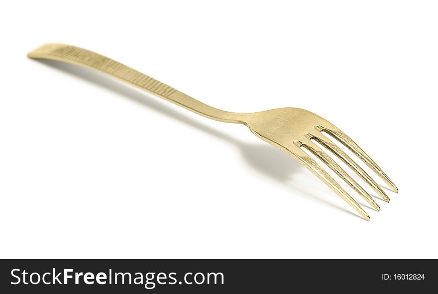 Golden fork isolated on white background