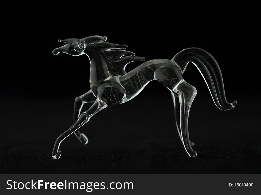Studio shot of the glass horse isolated on white.