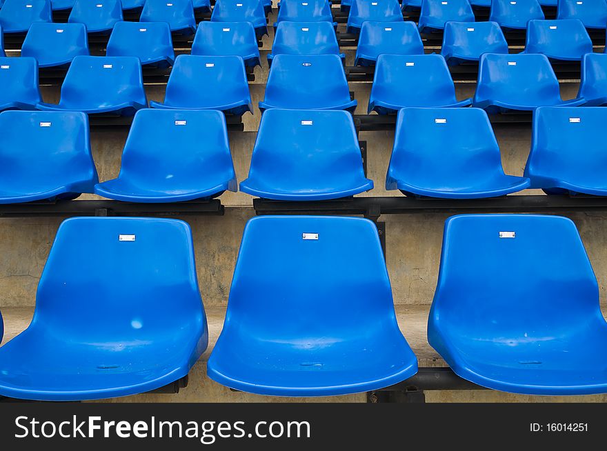 Blue seats in the stadium. Blue seats in the stadium