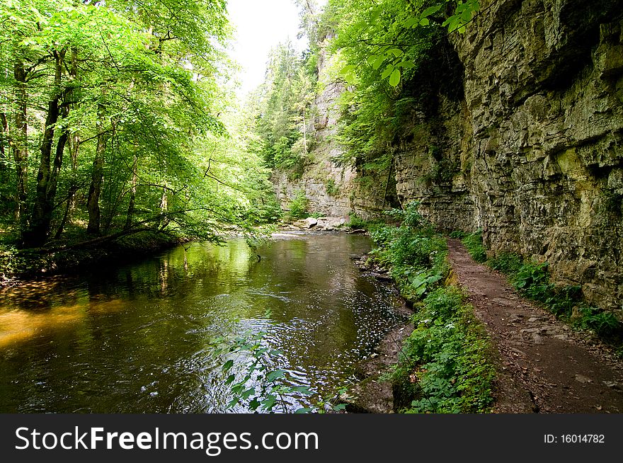 Trail in the Black Forest between river and rocks. Trail in the Black Forest between river and rocks
