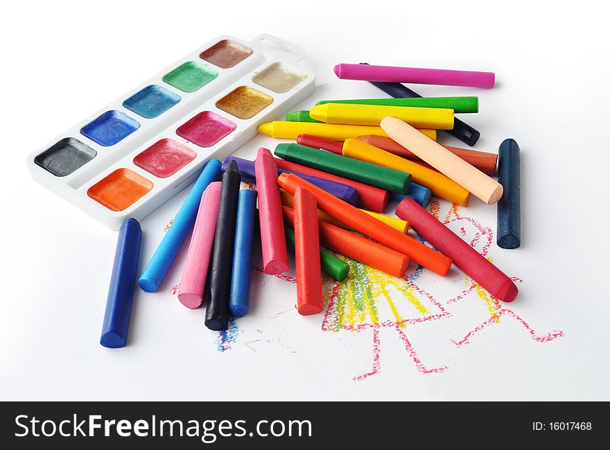 Watercolours and heap of colourfull crayons