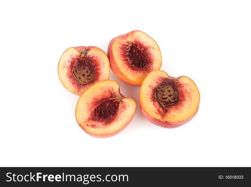 Fresh peach fruits isolated on white background