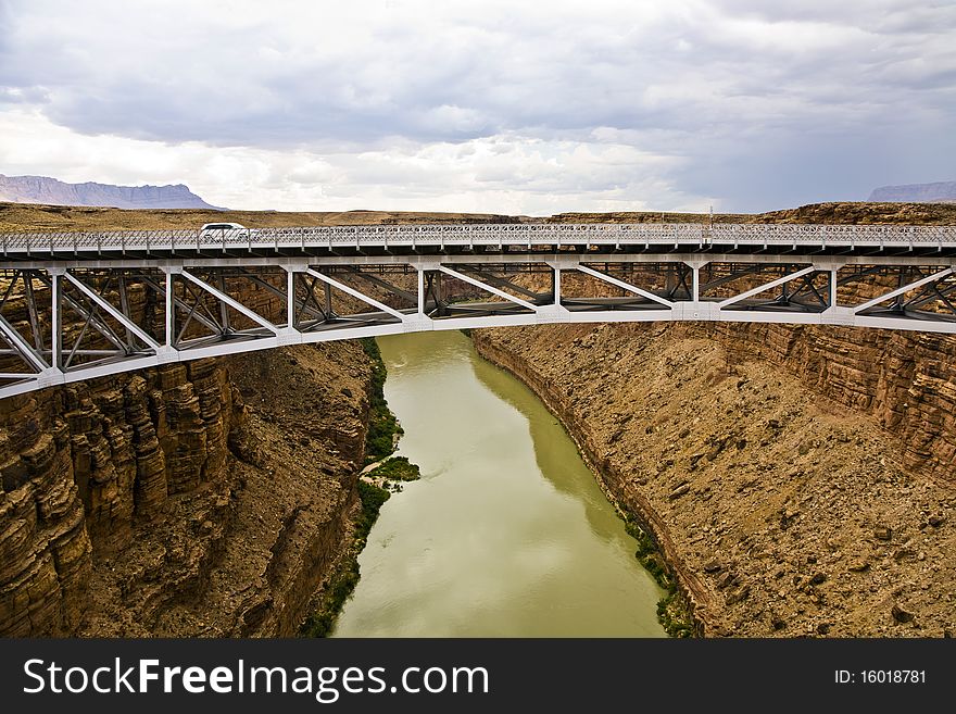 Navajo Bridge spans the Colorado at Marble Canyon. Navajo Bridge spans the Colorado at Marble Canyon