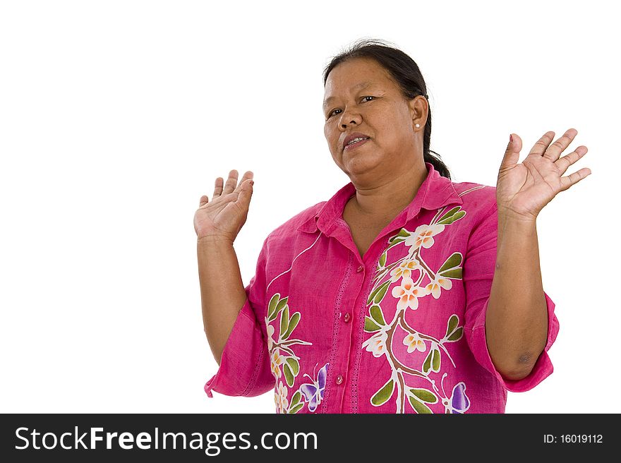 Asian woman in her 50s with hands up, isolated on white. Asian woman in her 50s with hands up, isolated on white