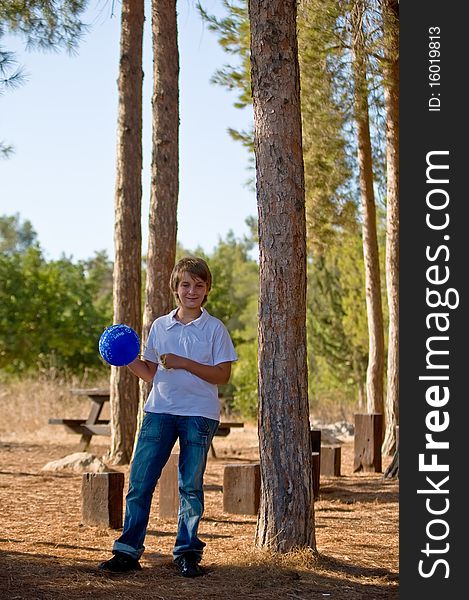 A boy with a balloon  on the background of nature. A boy with a balloon  on the background of nature.