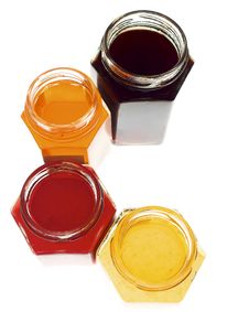 Group Of Colorful Hexagonal Jars Royalty Free Stock Image