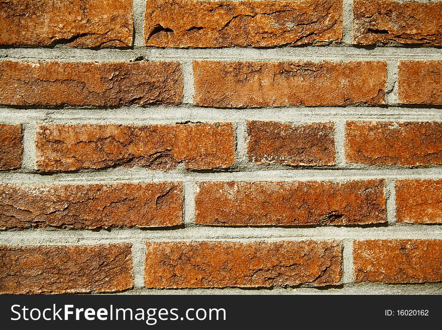 A piece of wall made from bricks. A piece of wall made from bricks