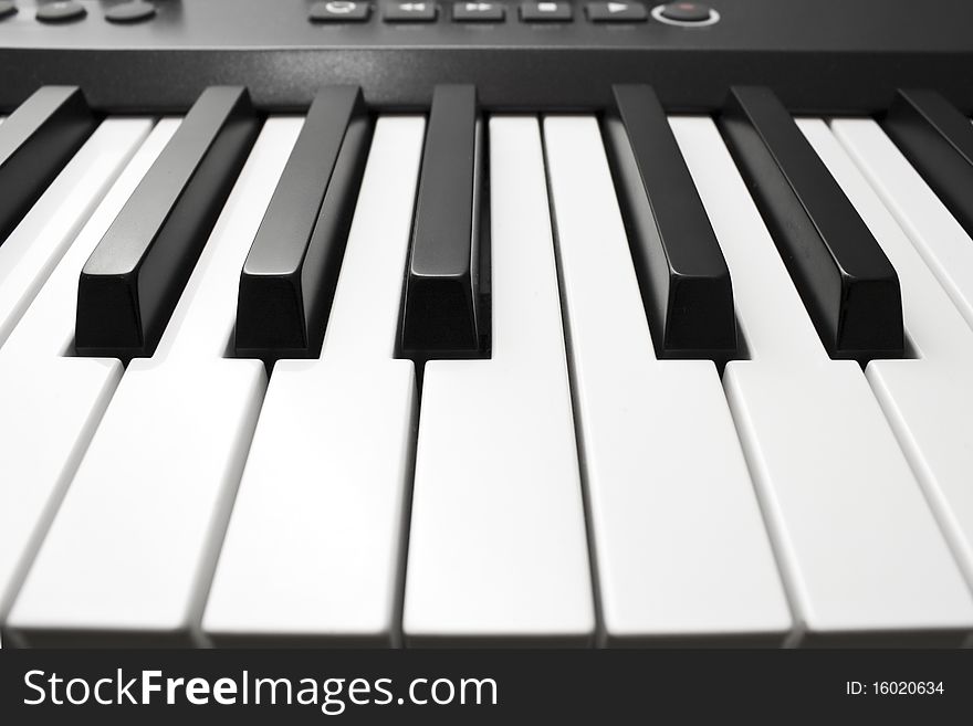 Close up shot of black & white piano keys