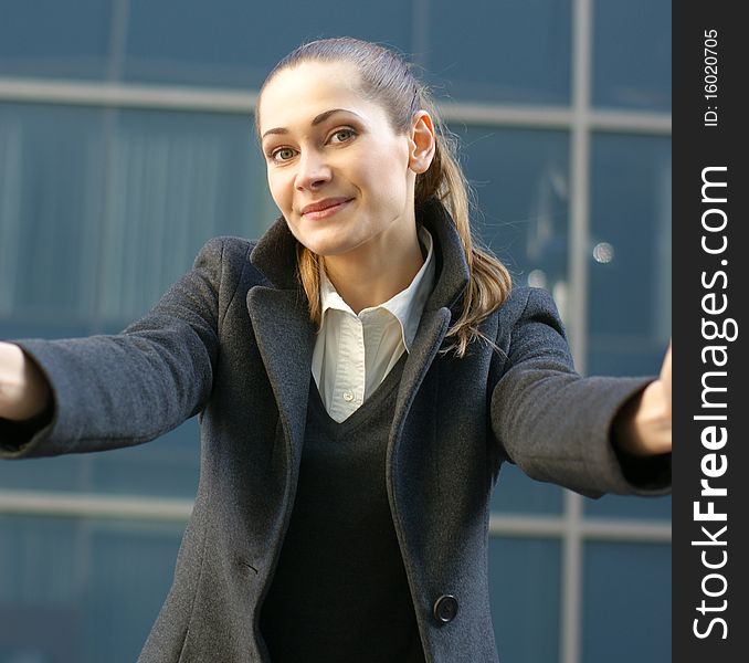 A Young And Cheerful Brunette Business Woman