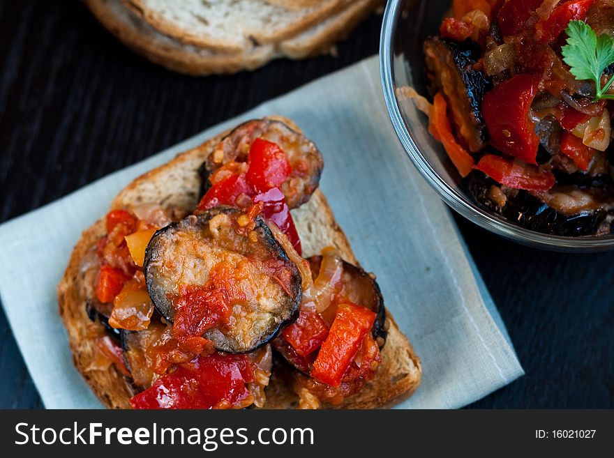 Toasted bread with vegetable ragout. Toasted bread with vegetable ragout