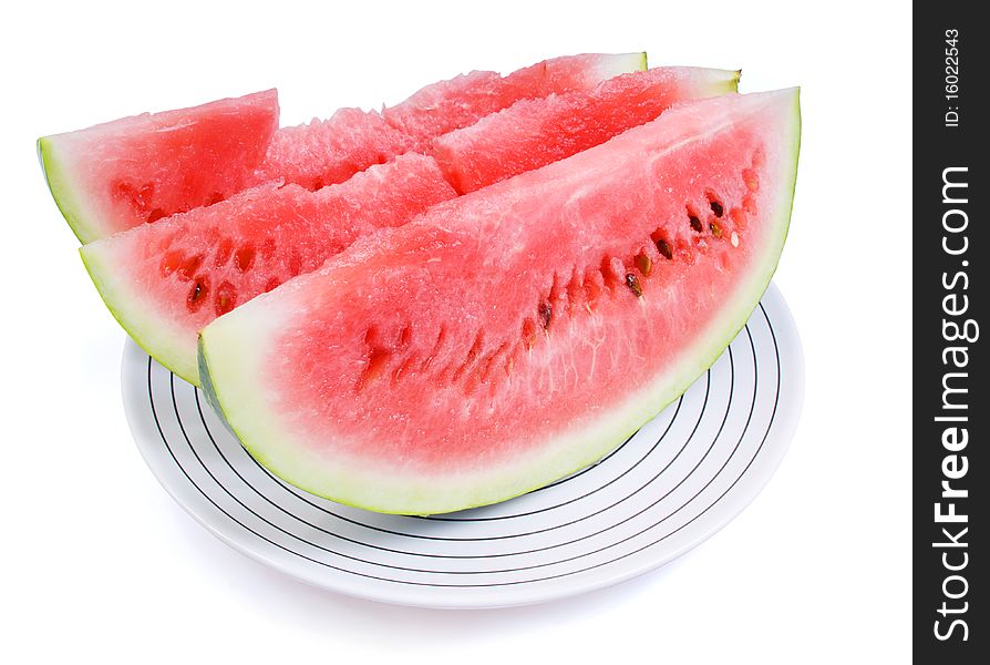 Three portions of a water-melon on a white plate