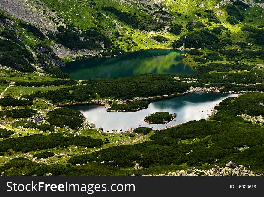 Beautiful landscape of lakes in mountains in valley.