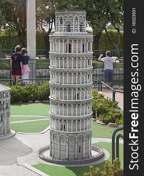 Tower of pisa miniature in park with childrens