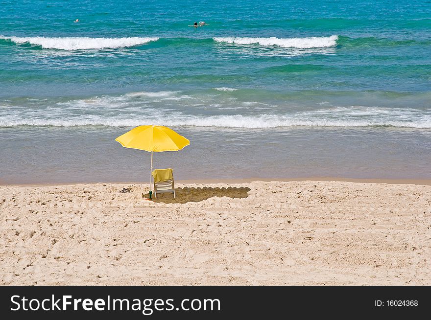 View Of  Chair And Umbrella On The Beach .