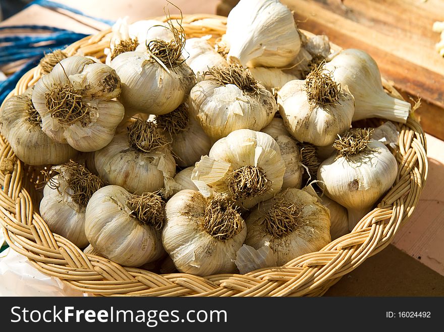 Basket of Garlic Bulbs at a farmer's market