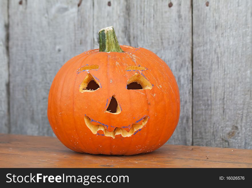 Halloween pumpkin on the bench