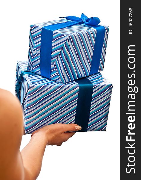Woman's hands with a blue gifts boxes isolated on white background. Woman's hands with a blue gifts boxes isolated on white background