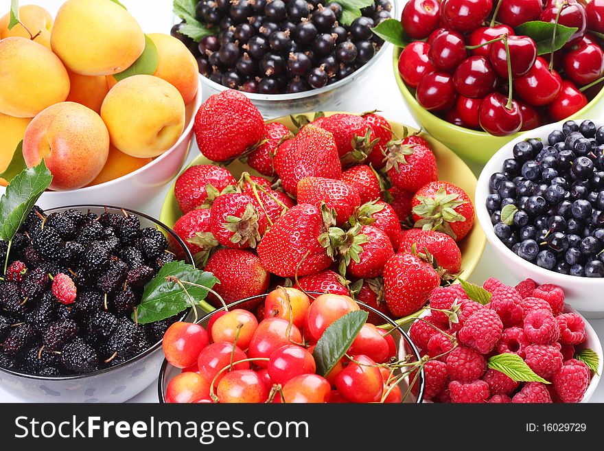 Different berries in bowls. Variety of berries. Different berries in bowls. Variety of berries.