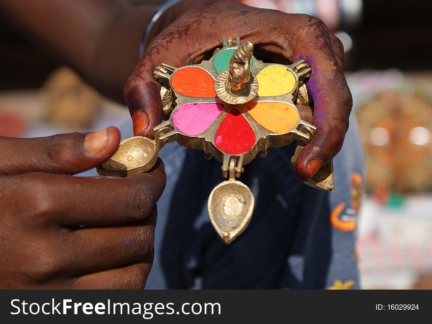 Colourful powders used for religious purposes by indian people in a special box, Orccha, India. Colourful powders used for religious purposes by indian people in a special box, Orccha, India