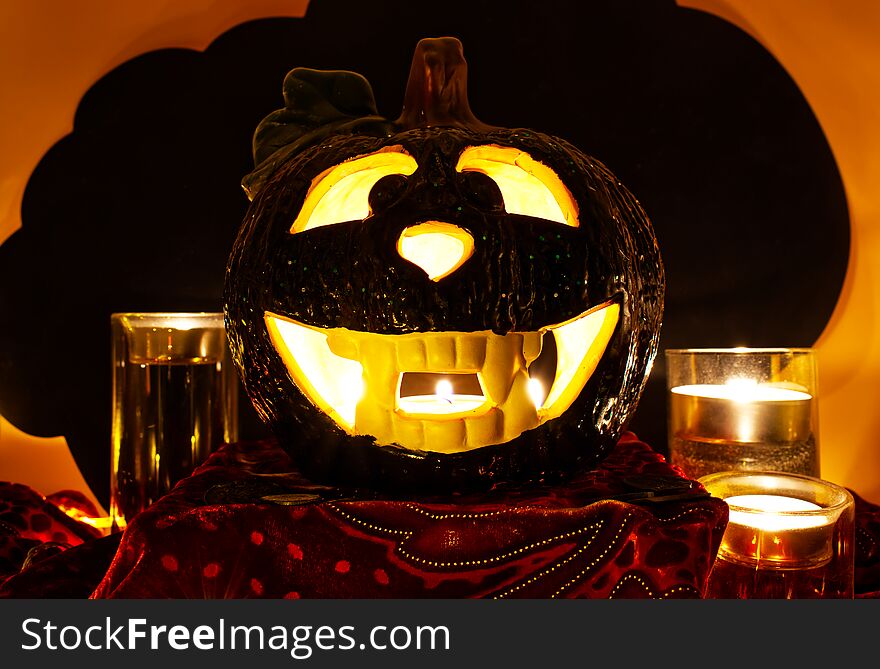 Halloween Pumpkin, scary Jack O`Lantern on black cloud background