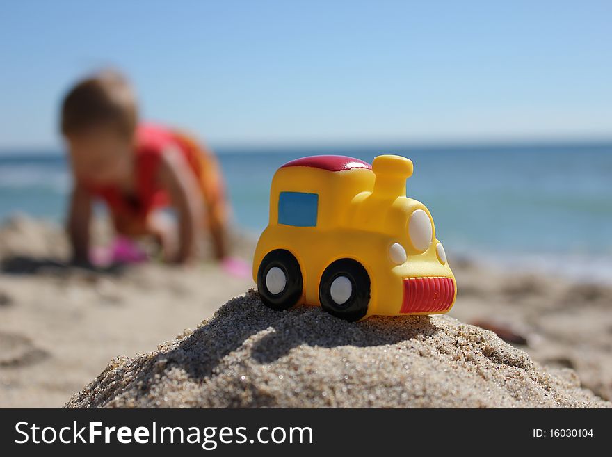 Child playing in the sand. Child playing in the sand