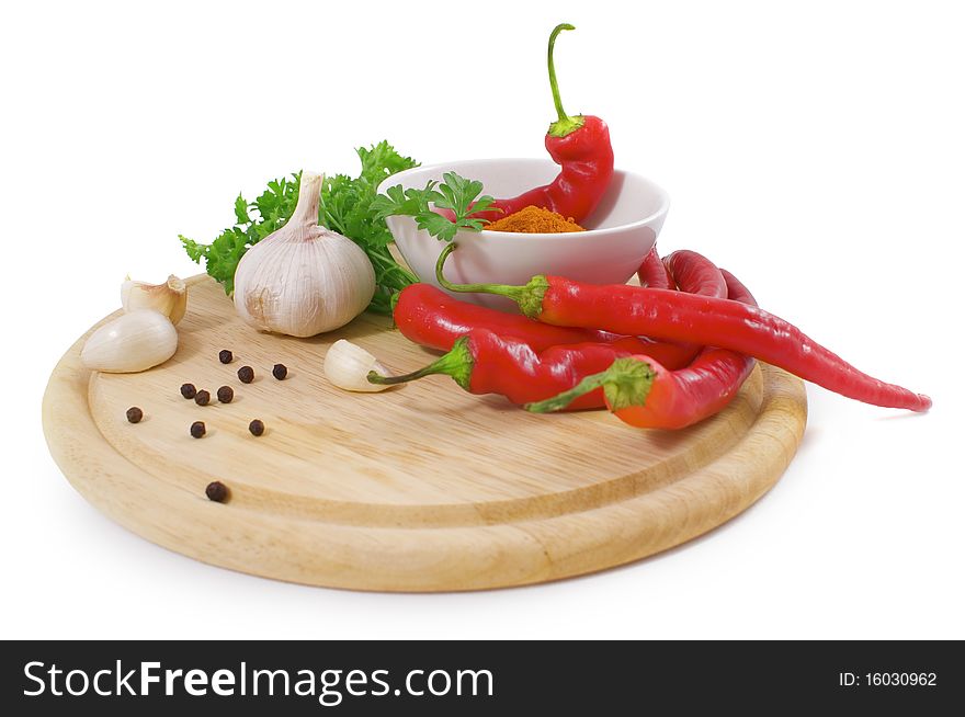 Nice fresh spices; greens and vegetables isolated on white background with clipping path