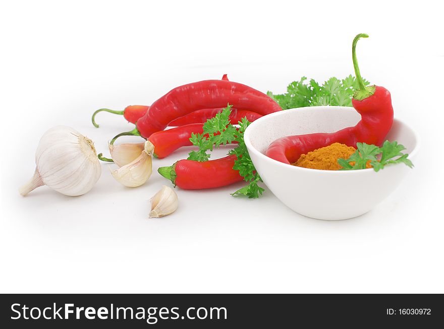 Nice fresh spices, greens and vegetables isolated on white background with clipping path