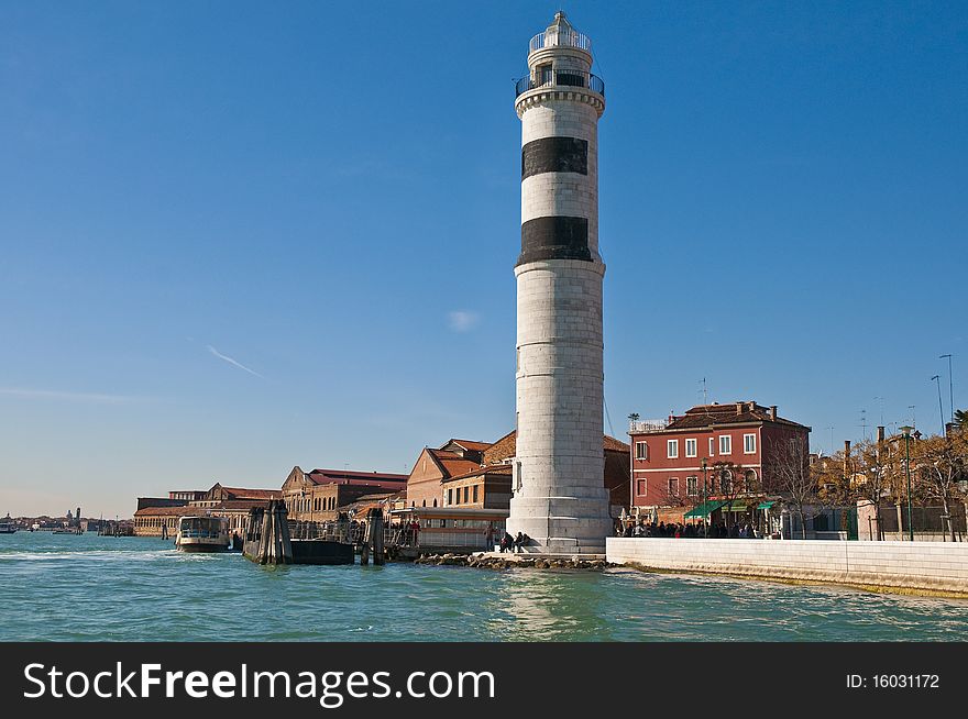 White lighthouse locatad at Murano Island, Italy