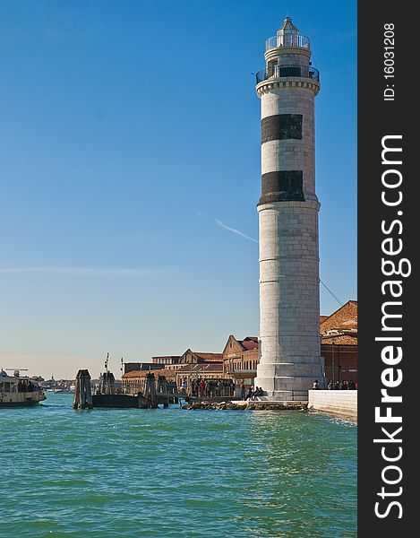 White lighthouse locatad at Murano Island, Italy