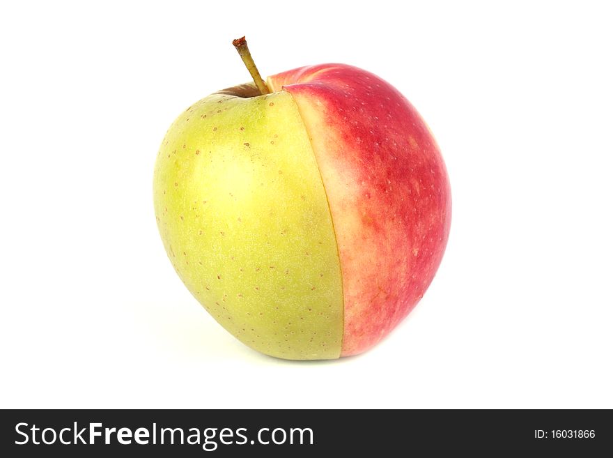 Half green and half red apple, isolated on white background.