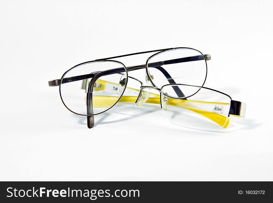 Two spectacles on white background