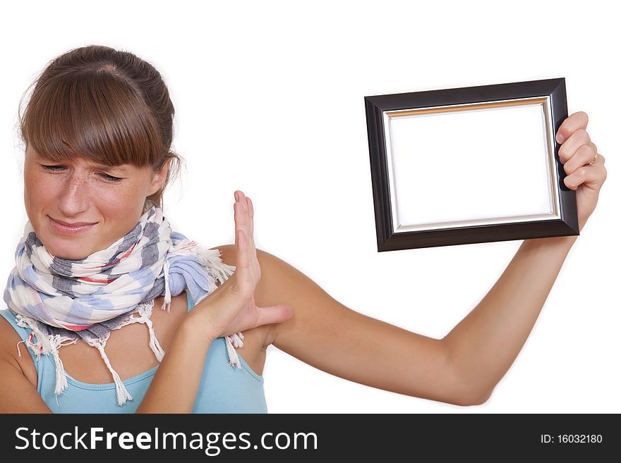 Unhappy woman with photo frame - isolated over white background