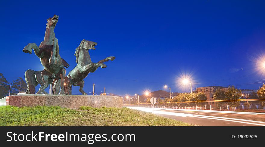 Night scene - three horses sculpture