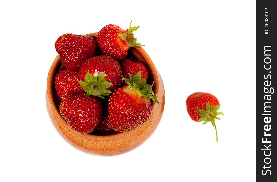 The red strawberries in a pot. The red strawberries in a pot