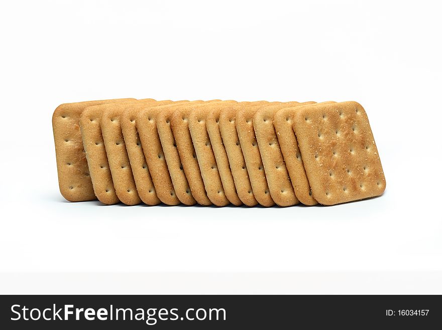 Stack of crackers isolated on white background with clipping path