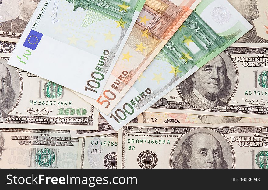 Background from dollars and euros banknotes