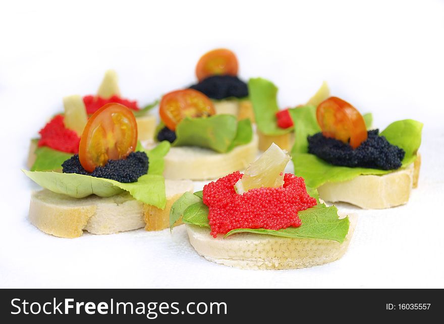 Studio photo of delicious caviar sandwiches