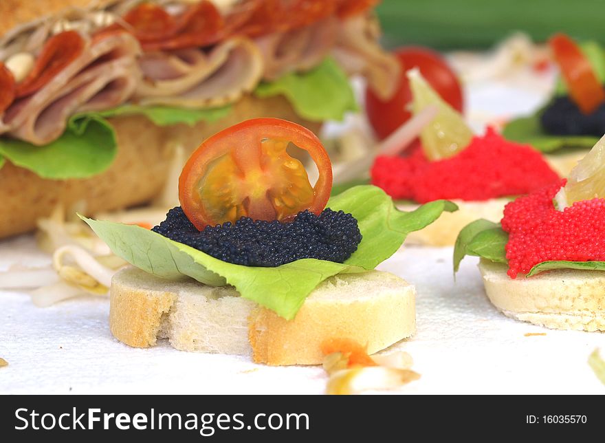 Studio photo of delicious caviar sandwiches