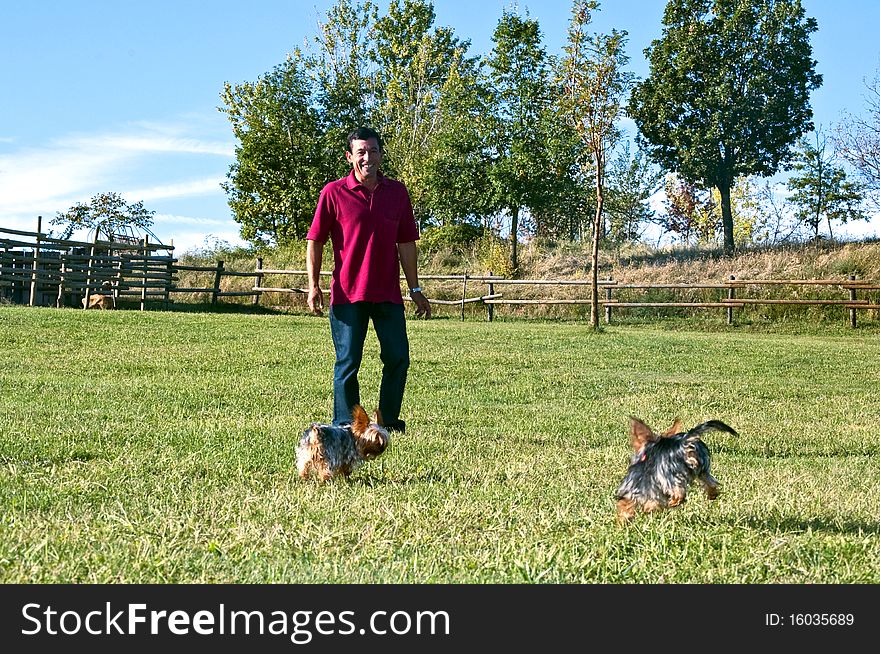 Man strolls with his dog in the countryside. Man strolls with his dog in the countryside