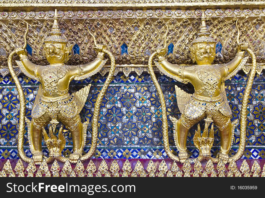 Garuda two gold color in the Temple of the Emerald Buddha , Bangkok , Thailand ,
