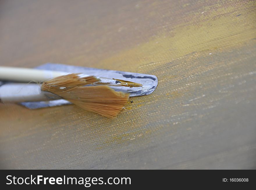 Set of bristles over paint smudges. Set of bristles over paint smudges