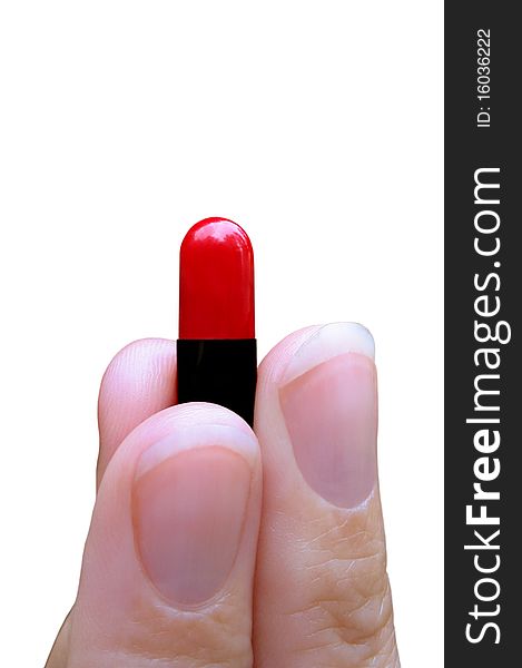 Holding a medicine pill on a white background