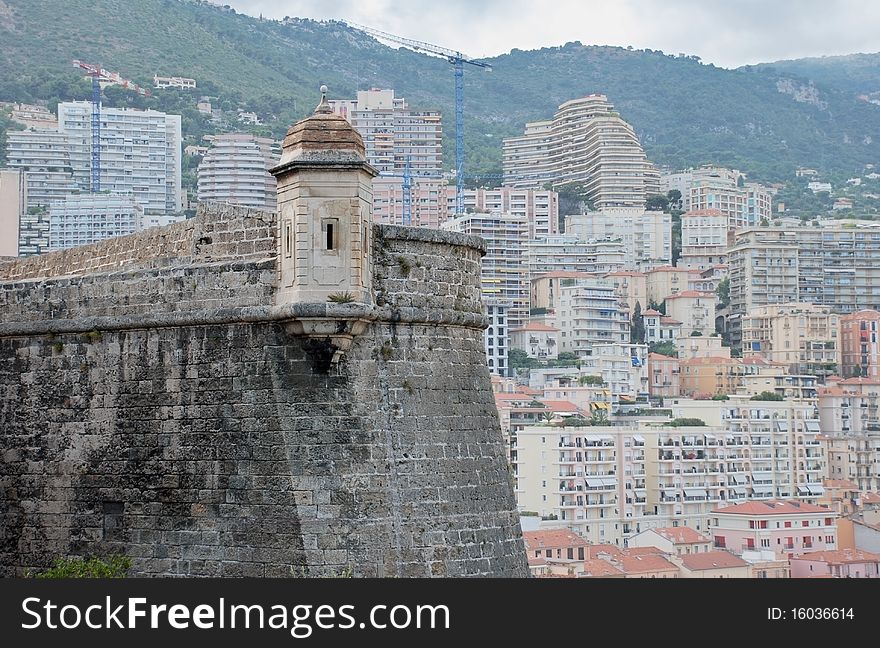 Old fortress and modern buildings in Monaco. Old fortress and modern buildings in Monaco.