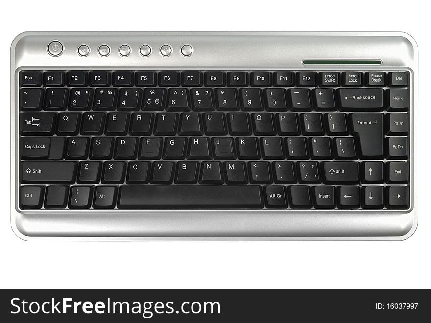 Wireless metallic keyboard isolated with clipping path over white background. Wireless metallic keyboard isolated with clipping path over white background