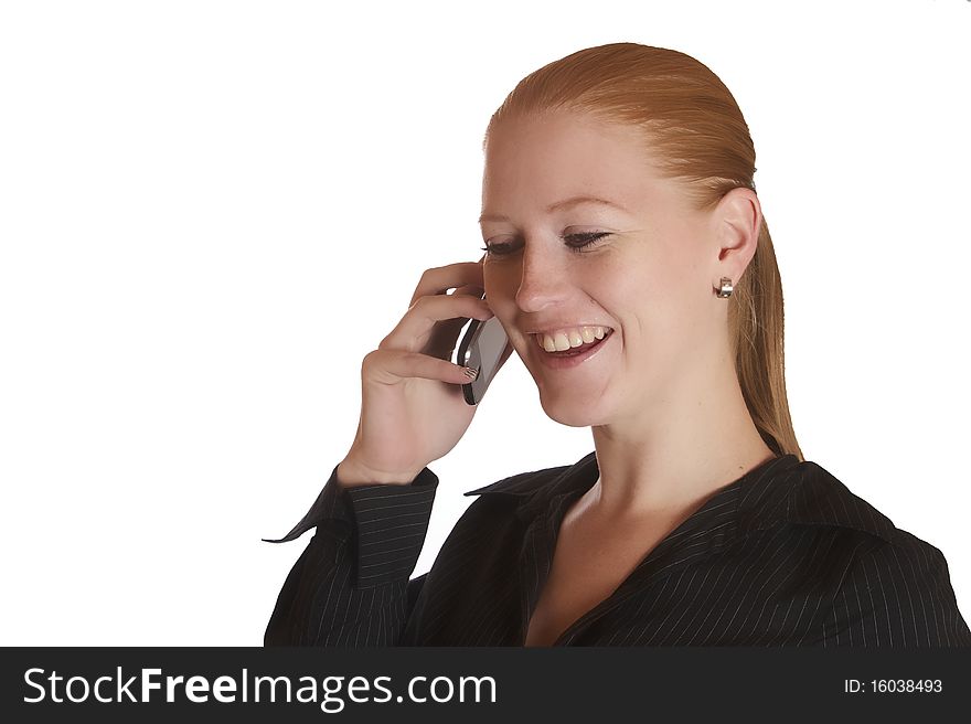 Young red haired lady talking on the phone. Young red haired lady talking on the phone